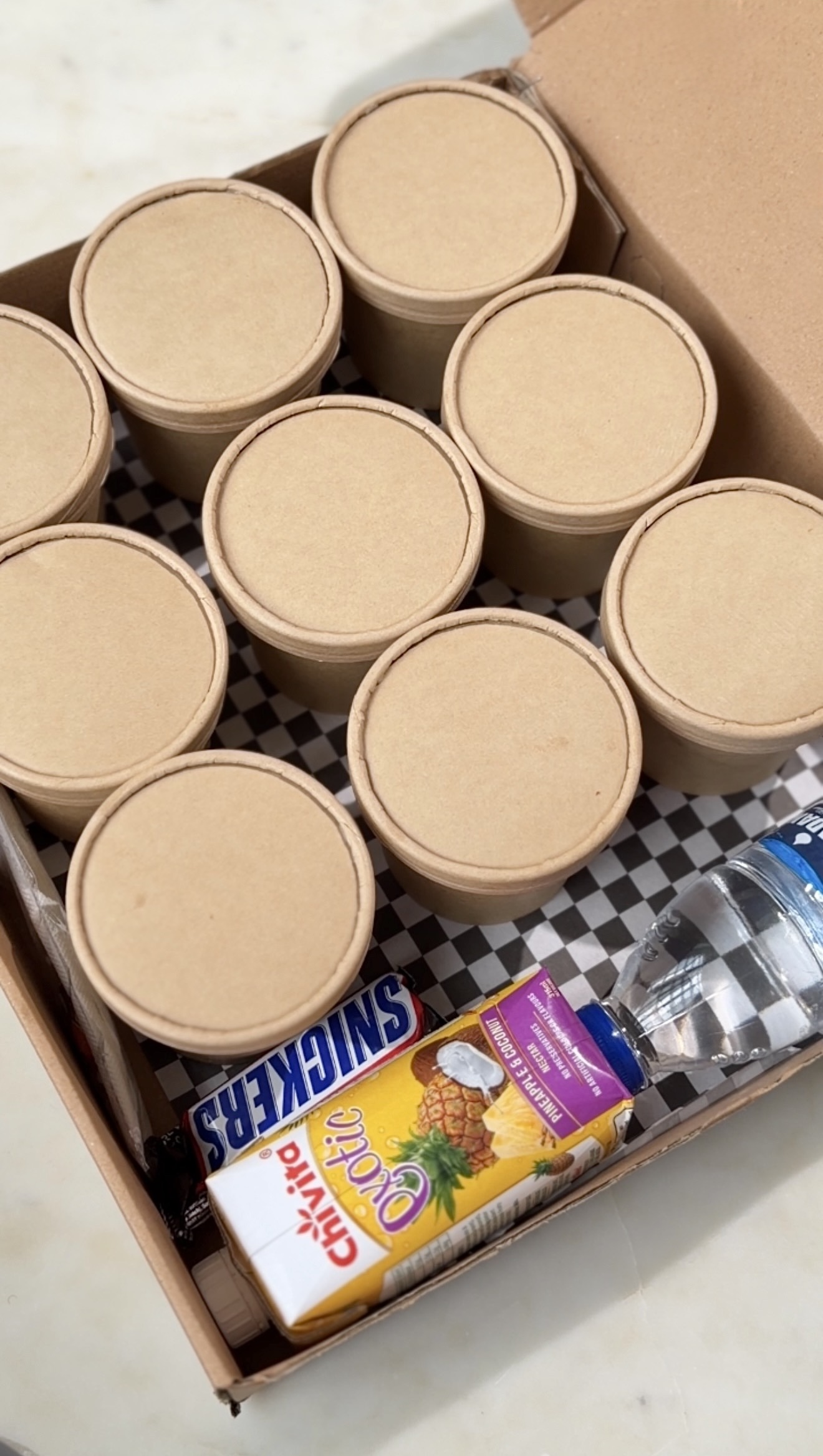 Delight Food Box with every cup lidded and ready to go