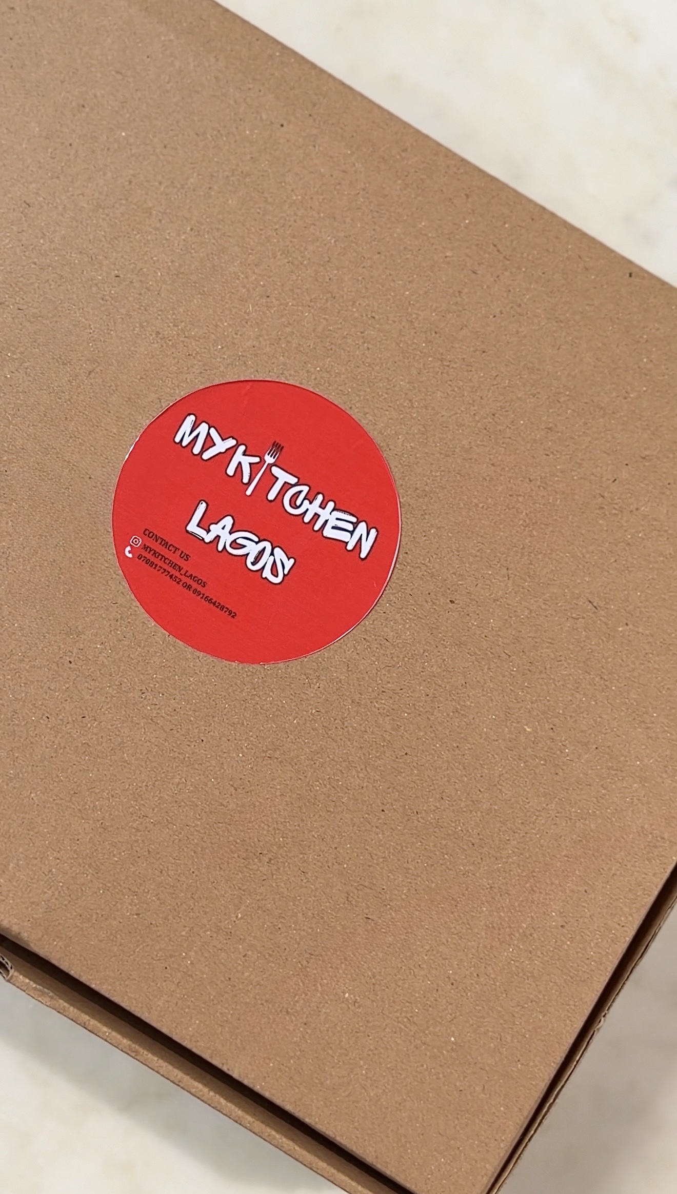 Delight Food Box sealed and ready, showing the My Kitchen Lagos branded box
